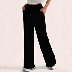 Photo: Kensington Drawstring Wide-Leg Trousers | Seoden London — view 4