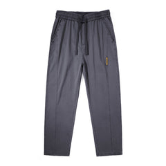 Photo: Men's Cotton Drawstring Straight Leg Trousers | Seoden London — view 1