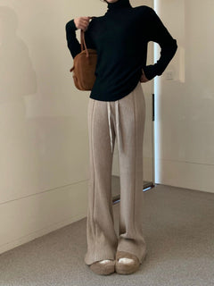 Photo: Lana Ribbed Knit Wide-Leg Trousers | Seoden London — view 10