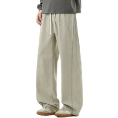 Photo: Men's Straight Leg Cotton Drawstring Trousers | Seoden London — view 1