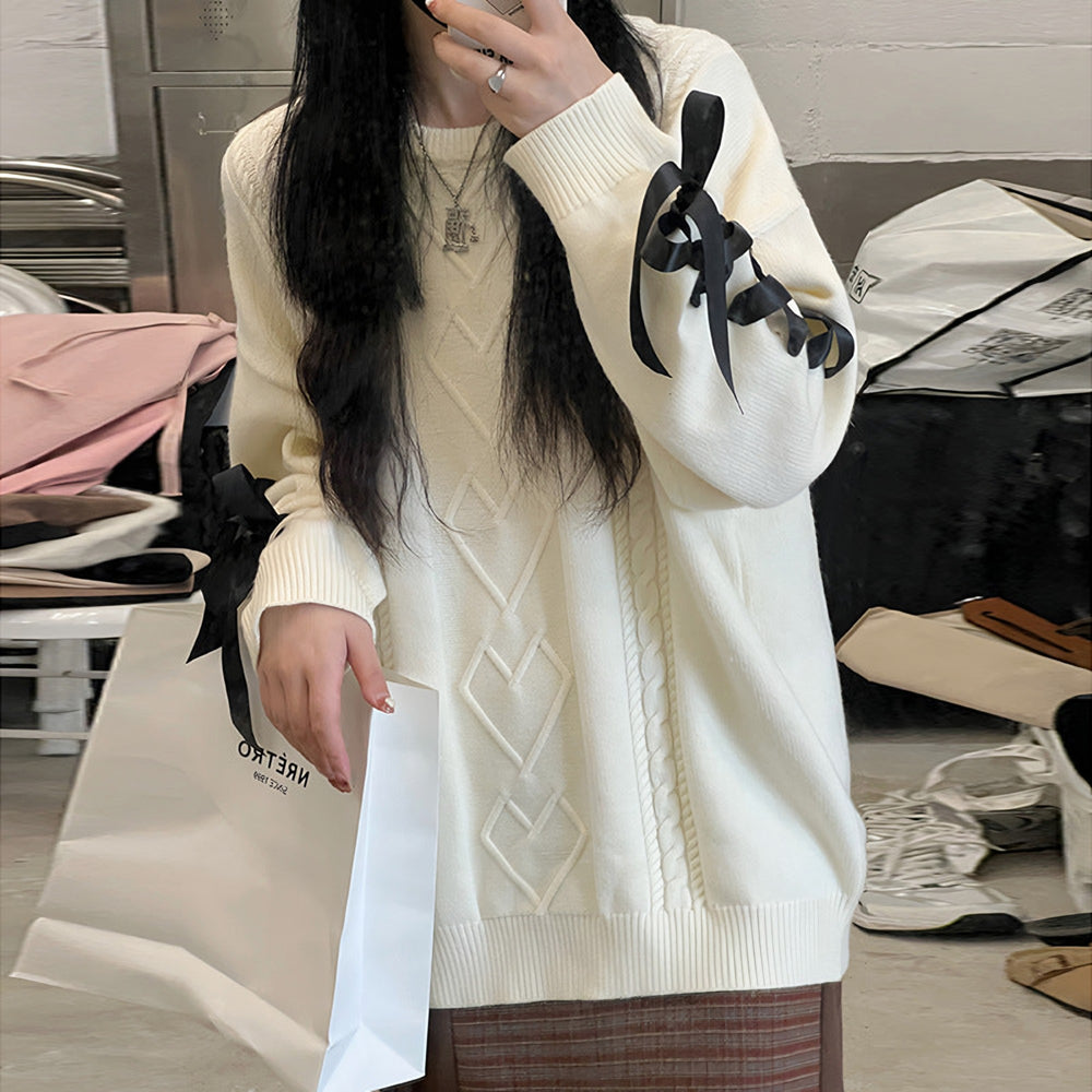 Photo: Women's Cotton Crew Neck Jumper with Tie Detail | Seoden London
