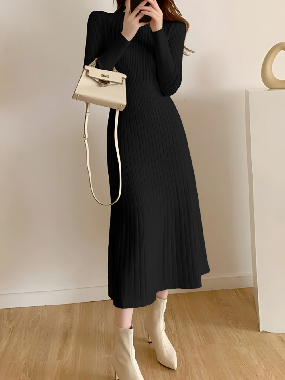 Photo: Women's Ribbed Knit Midi Dress with Long Sleeves | Seoden London