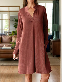 Photo: Women's V Neck Long Sleeve Mini Dress with Pockets | Seoden London — view 1