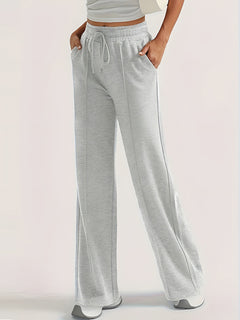 Photo: Kensington Drawstring Wide-Leg Trousers | Seoden London — view 6