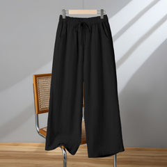 Photo: Women's Plus Size Linen Wide Leg Trousers | Seoden London — view 9