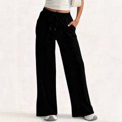 Photo: Kensington Drawstring Wide-Leg Trousers | Seoden London — view 1