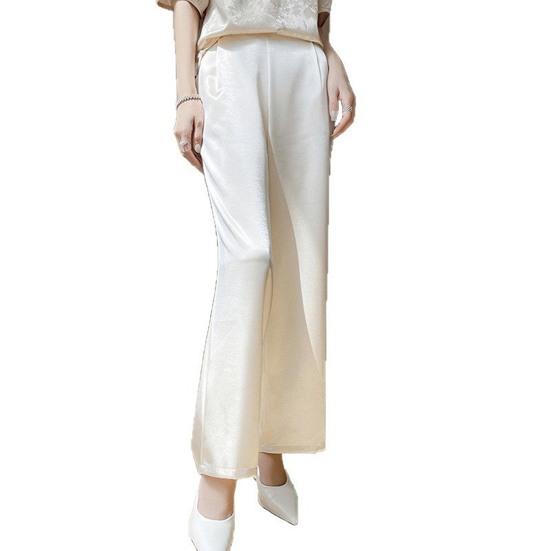 Photo: Cannes Satin-Sheen Wide-Leg Trousers | Seoden London
