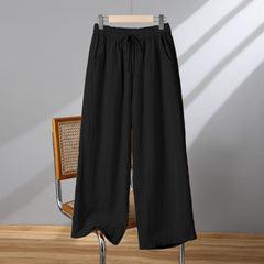 Photo: Women's Plus Size Linen Wide Leg Trousers | Seoden London — view 4