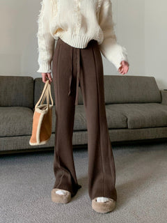 Photo: Lana Ribbed Knit Wide-Leg Trousers | Seoden London — view 9