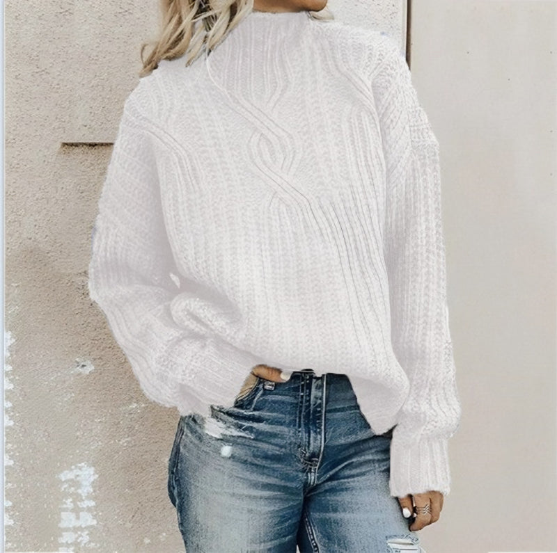 Photo: Women's Cable Knit High Neck Jumper | Seoden London