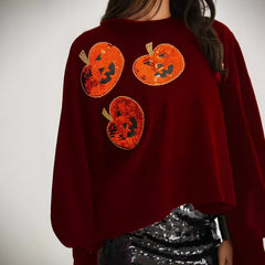 Photo: Greta Pumpkin Sequin Sweatshirt | Seoden London — view 1