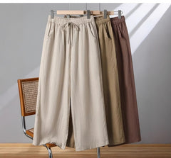 Photo: Women's Plus Size Linen Wide Leg Trousers | Seoden London — view 5