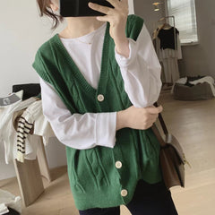 Photo: Women's V Neck Cable Knit Cardigan | Seoden London — view 8