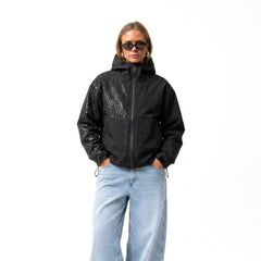 Photo: Serengeti Water-Reactive Leopard Rain Jacket | Seoden London — view 3
