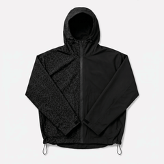 Photo: Serengeti Water-Reactive Leopard Rain Jacket | Seoden London — view 1