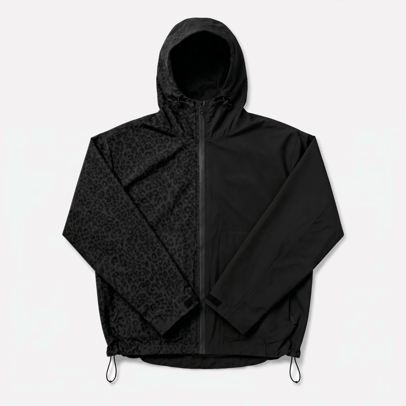 Photo: Serengeti Water-Reactive Leopard Rain Jacket | Seoden London